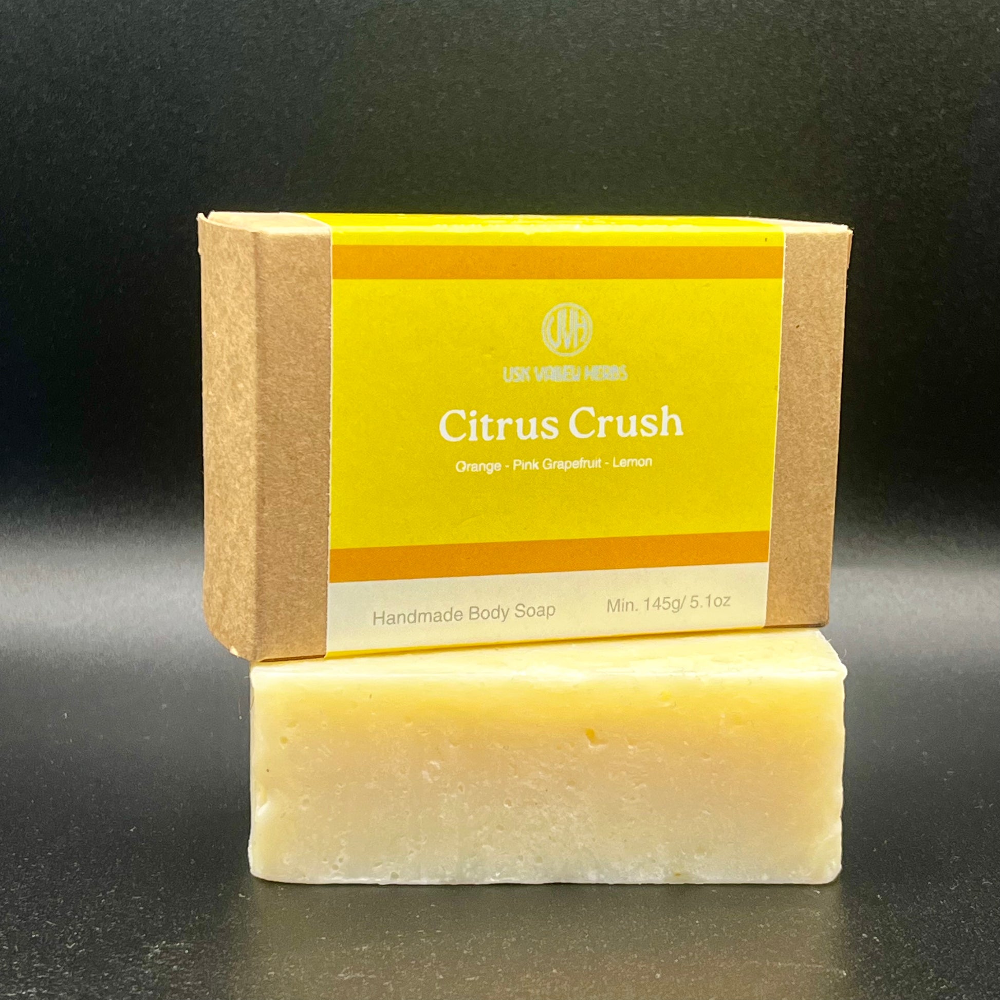 Citrus Crush handmade natural soap bar with essential oils of Sweet Orange pink grapefruit and lemon by Usk Valley Herbs in the Brecon Beacons