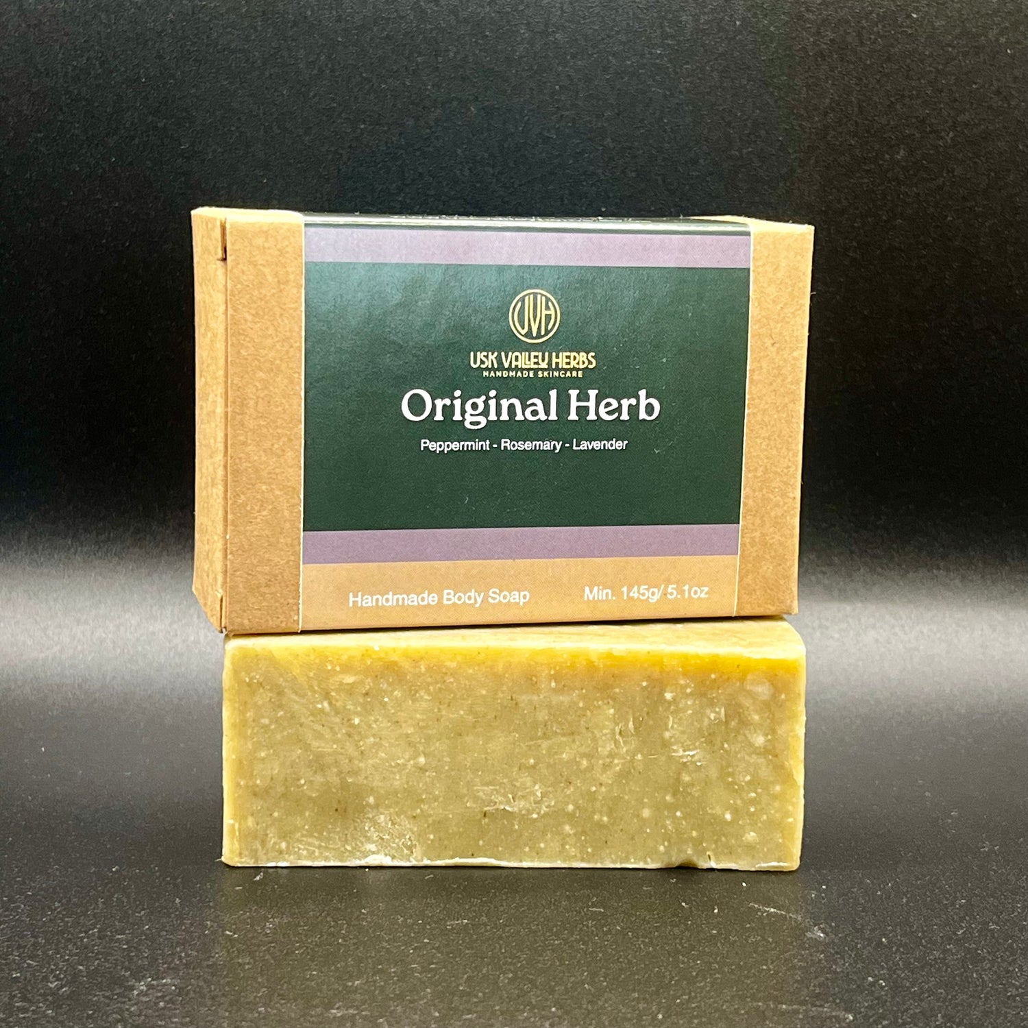 A bar of Original Herb soap made with essential oils of peppermint, lavender and rosemary. No palm oil, no fake scents, no SLS or parabens